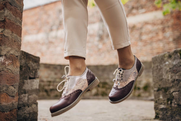 istock Woman wearing modern shoes 1317221462