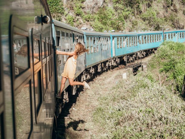 istock Tourist in Sri Lanka riding train 1317225124