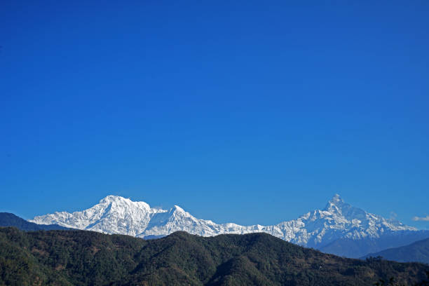 istock Snowy mountain view with clear blue sky, Annapurna Himalayan range- Nepal 1317225230