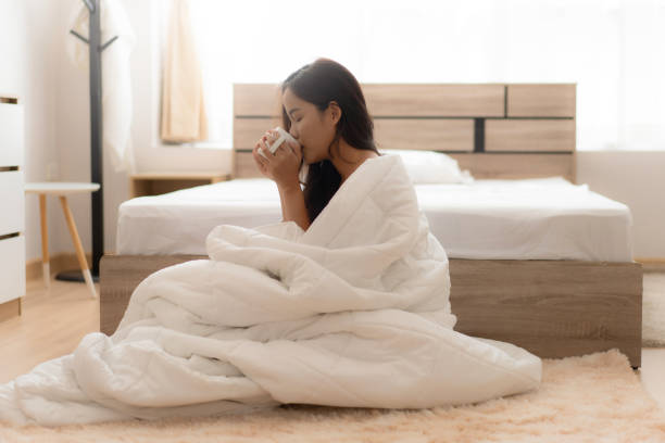 istock Asian women drinking coffee in the morning 1317225536