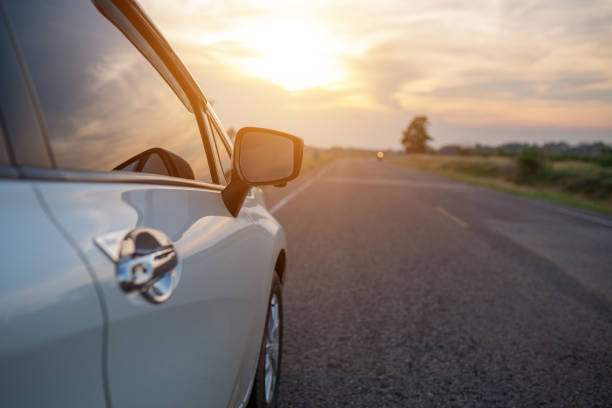 istock Eco-Car white color glass reflection on the road 1317225778