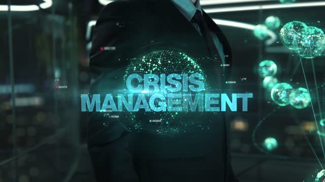 Businessman with Crisis Management hologram concept