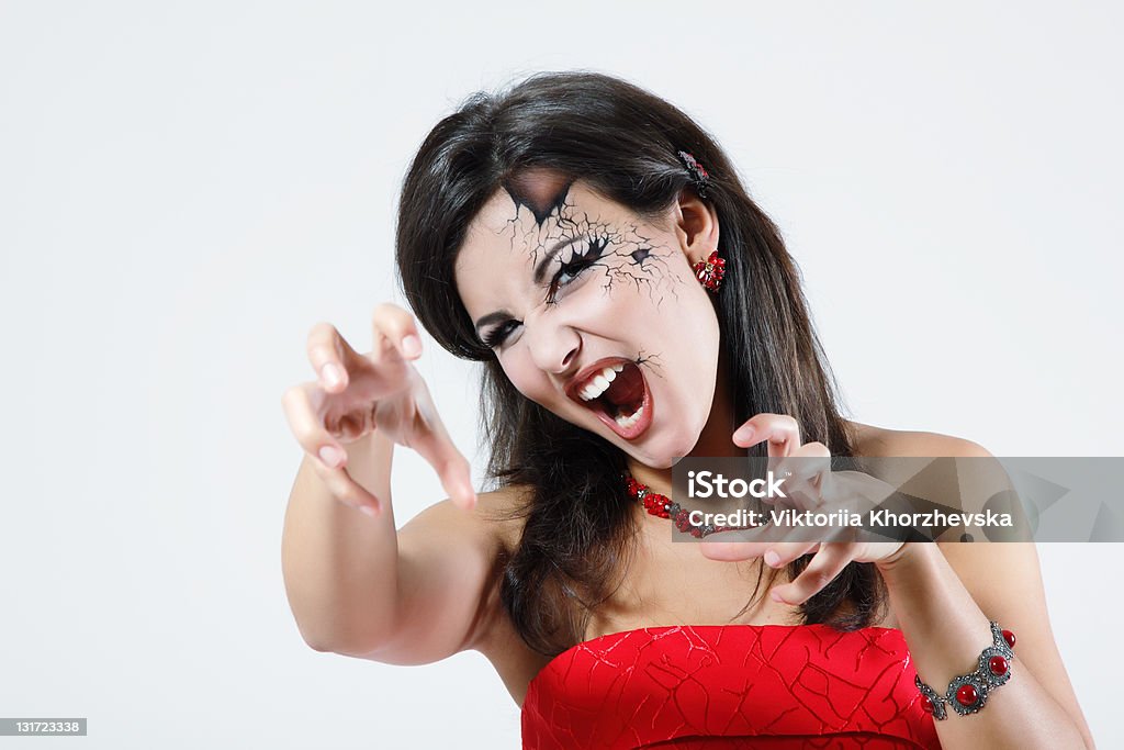 woman beautiful halloween vampire woman beautiful halloween vampire over night background Adult Stock Photo