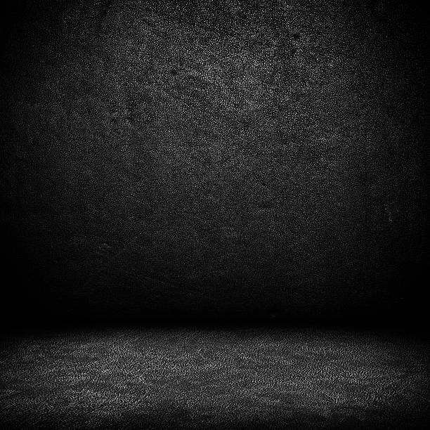 Black dark leather wall and floor background stock photo