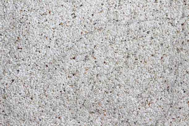 istock Exposed aggregate finish walls or floor. Concrete texture for background. Top view. 1317245127