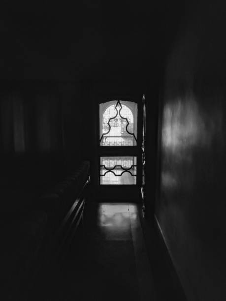 istock Light coming through a doorway. 1317245472