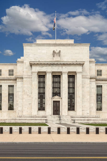 istock Federal Reserve Building and Blue Sky with Puffy Clouds, Washington DC, USA. 1317246361