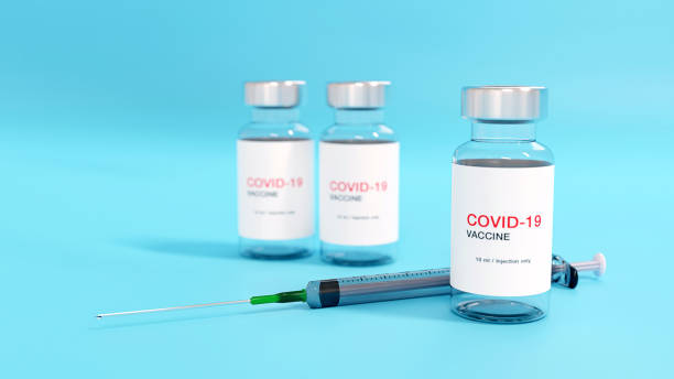 istock 3D rendering. Creative design for Covid-19 coronavirus vaccine bottles and syringe  for intramuscular injections. Corona virus (2019-nCoV virus) flu treatment drug pharmacy production concept. 1317246826