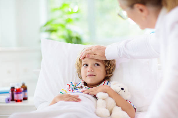 istock Sick little boy with asthma medicine. Ill child. 1317247355