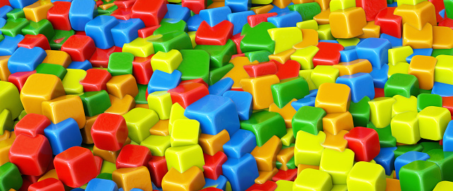 A messy pile of shiny colorful cubes melting into each other
