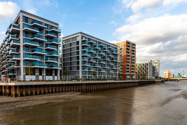 A new riverside neighbourhood in East London, just minutes from Canary Wharf and less than 30 minutes from West End. A new hub for business professionals as well as desirable place to live. Lovely river views and beautifully designed apartments and town houses. Shot on 7 May 2020.