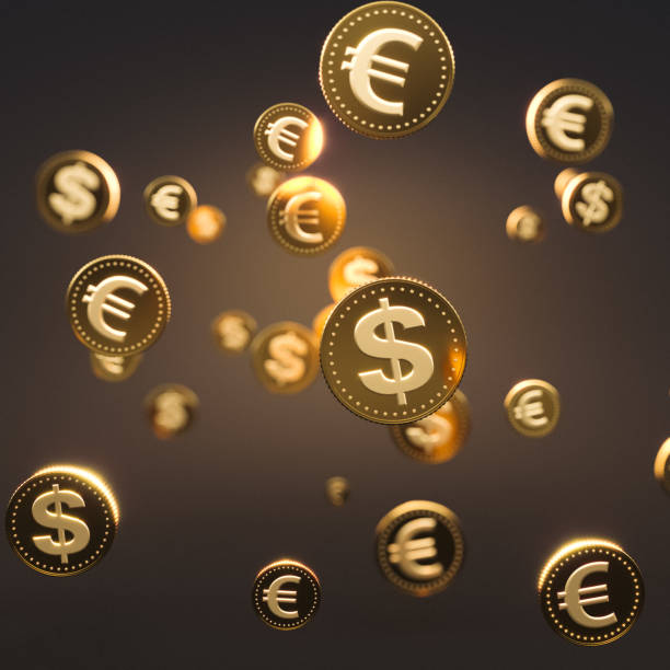 istock gold coin on brown background - euro dollar 1317250248