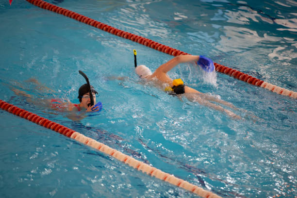 istock Diti athletes learn to swim in the pool. 1317253950