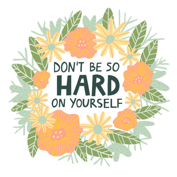 istock Don't be so hard on yourself hand drawn lettering quote in floral frame. 1317254632