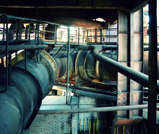 istock Old rusty piping in the factory 1317256817