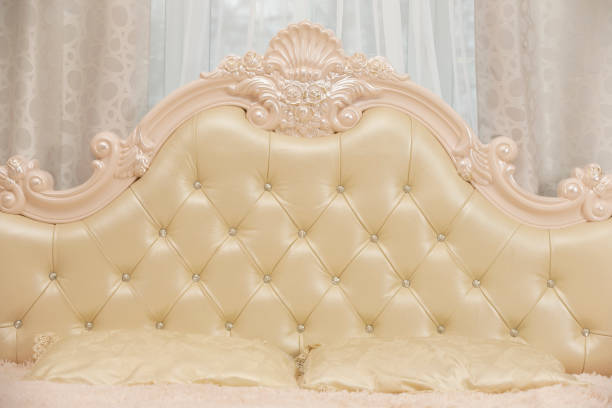 istock Beige double bed headboard with carriage. 1317257483