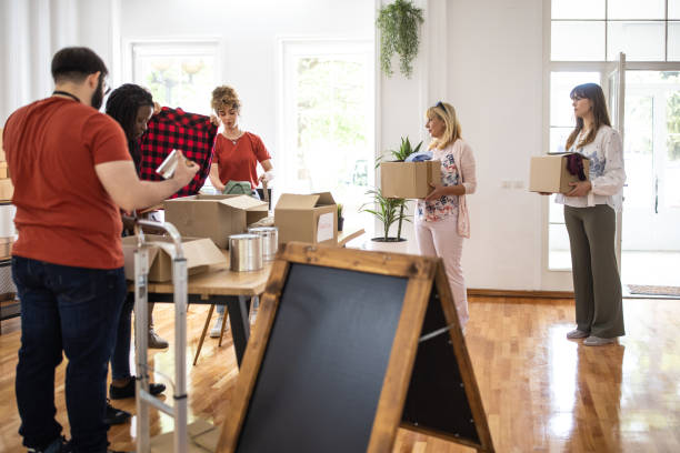 istock Generous people donating their stuff to charitable donation 1317257813
