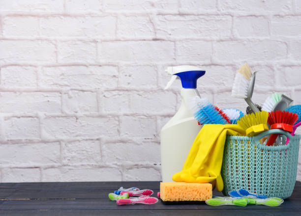 istock blue plastic basket with brushes, sponges and rubber gloves for cleaning 1317259158