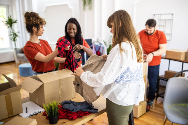 istock Woman donating goods to charitable foundation 1317259303