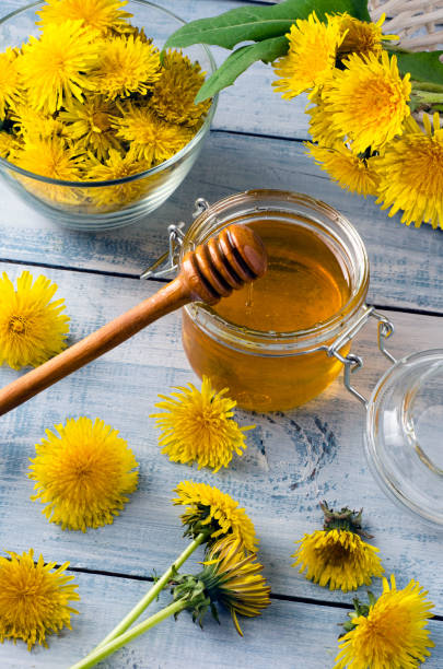 istock Honey from dandelions fresh flowers. 1317260678