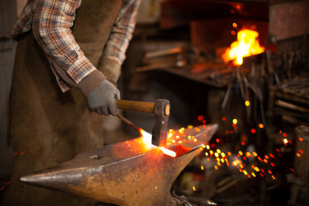 istock Midsection Of Man Working With Burning Candles 1317260918