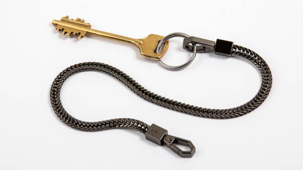 istock Home key with black metal chain. Horizontal banner 1317262552