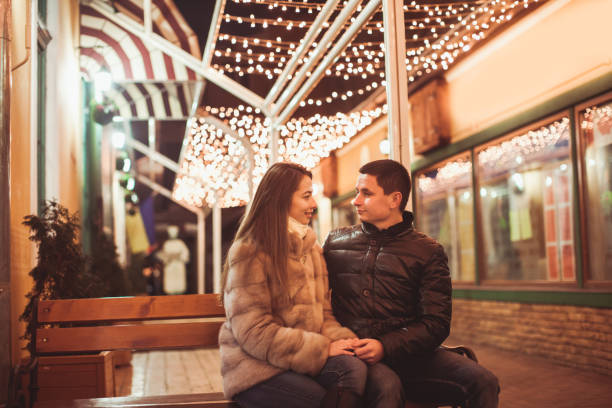 istock Young Couple Sitting In Illuminated Room 1317267679
