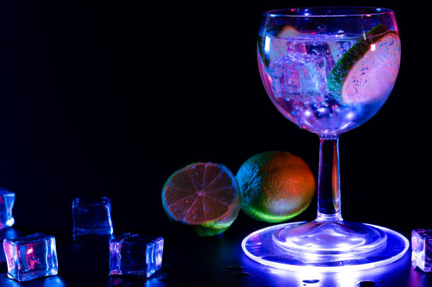 istock Gin Tonic cocktail in a glass with a lime and ice cubes 1317271455