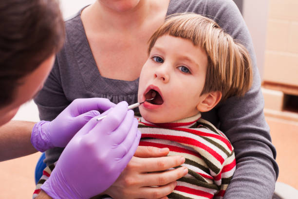 istock Boy Doing Dental Check Up At Clinic 1317273694