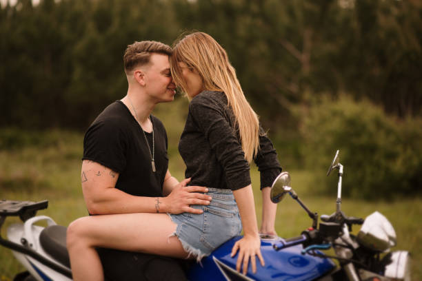 istock Young couple on a motorcycle 1317275988