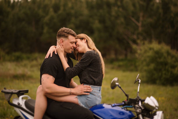 istock Young couple on a motorcycle 1317275989