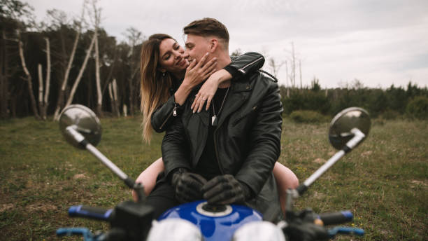 istock Young couple on a motorcycle 1317275997