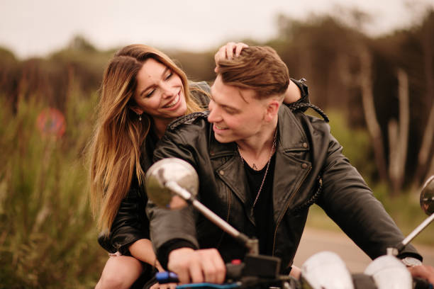 istock Young couple on a motorcycle 1317276027