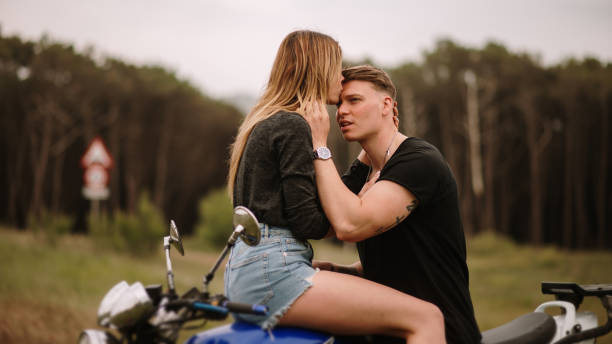 istock Young couple on a motorcycle 1317276696