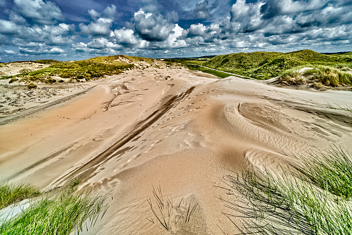 Access path to the beach in the dunes of the west coast of the island