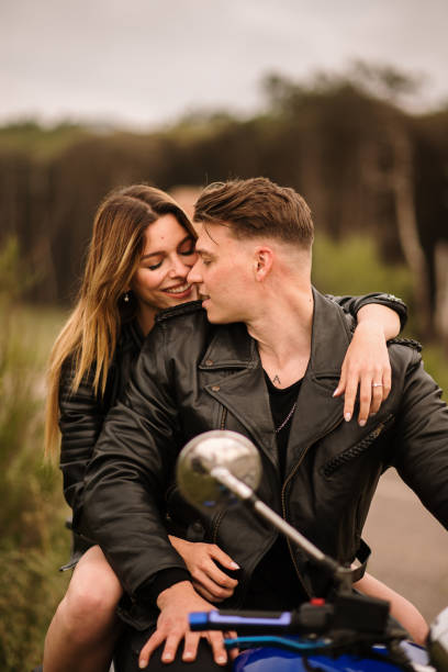 istock Young couple on a motorcycle 1317276778