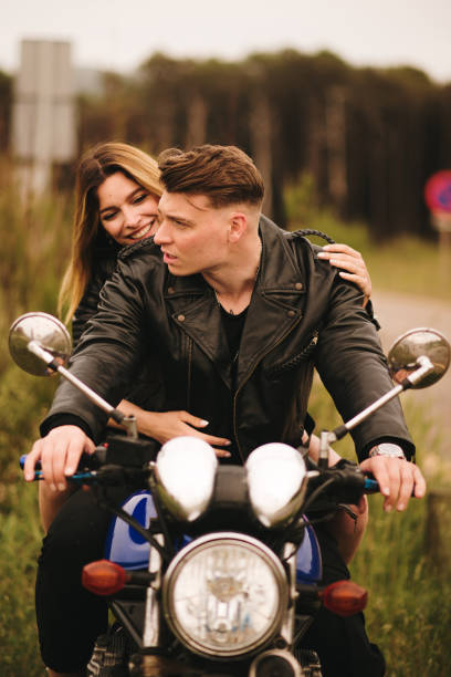 istock Young couple on a motorcycle 1317276803