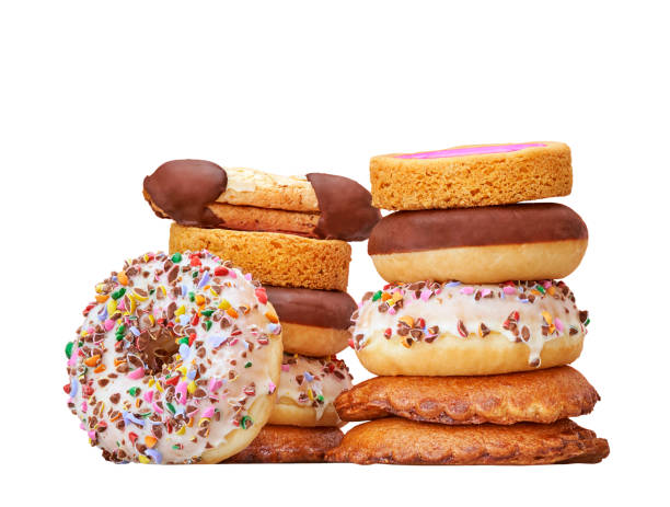 istock Various donuts, cookies and pastries in a studio setting, isolated on white 1317276836