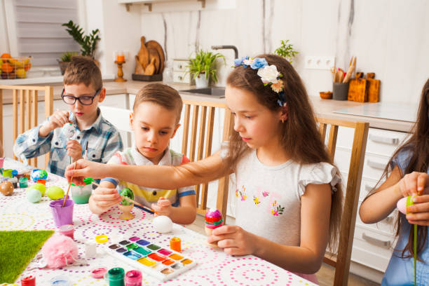 istock Cute Kids Painting At Home 1317277566