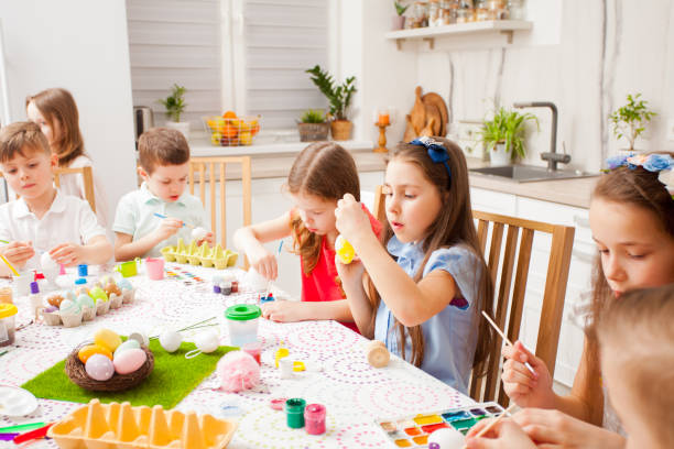 istock Cute Kids Painting At Home 1317277577
