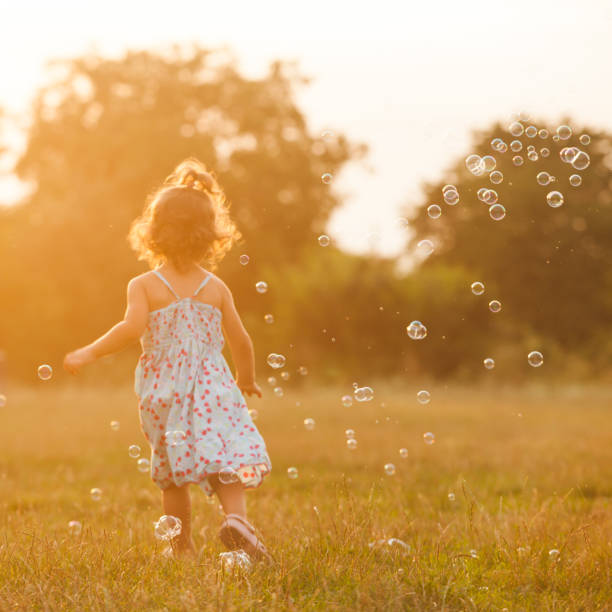 istock Girl Playing On Field 1317279052