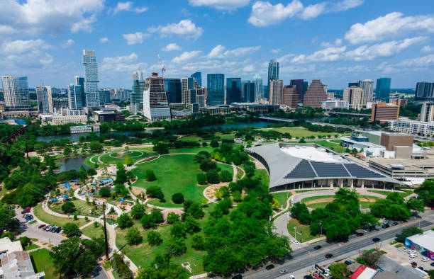 sustainable cityscape of modern austin texas skyline with solar panels and urban green space - town home imagens e fotografias de stock