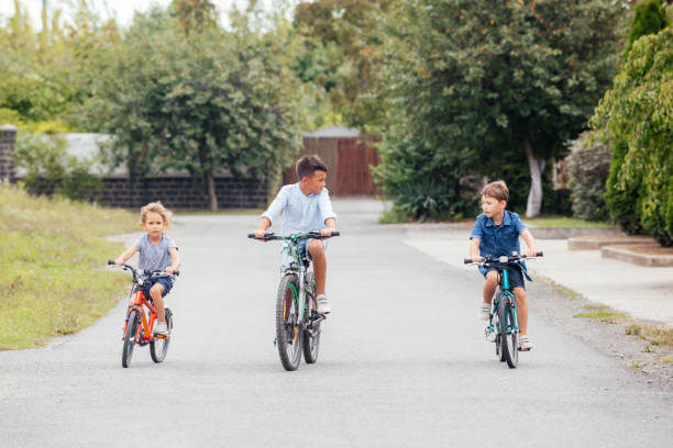 istock Rear View Of People Riding Bicycle 1317280796