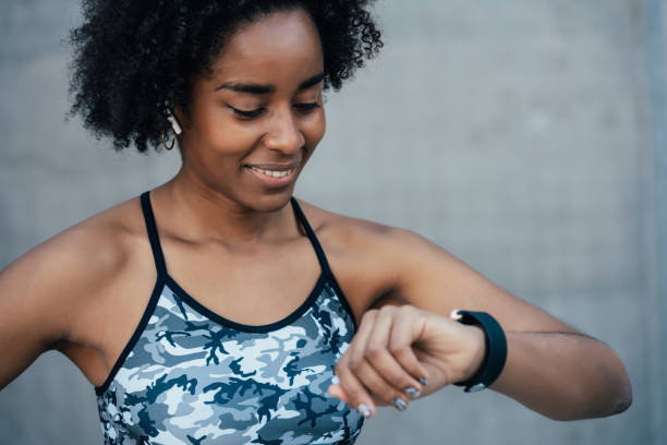 istock Fitness woman checking time on smart watch. 1317283794