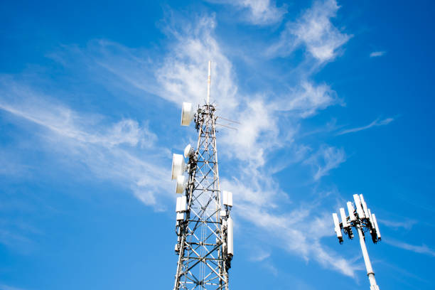 istock Radio, communication and cell towers on blue sky background 1317285697