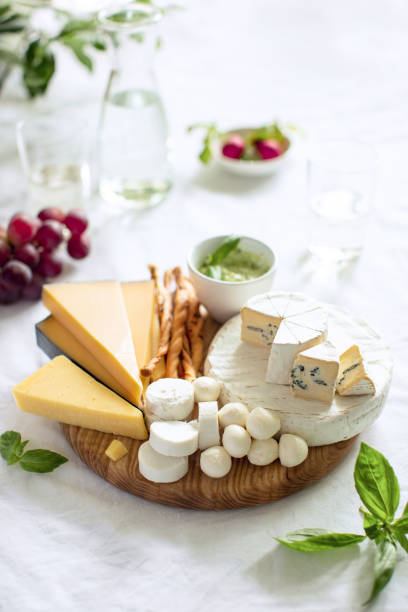 istock Cheese Board served with a chilled drink for a light snack 1317289003