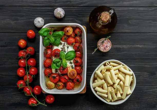 Photo of Trending viral Feta baked pasta recipe made of cherry tomatoes, feta cheese, garlic and herbs