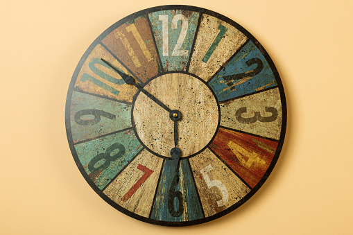 decorative wall clock on gray background