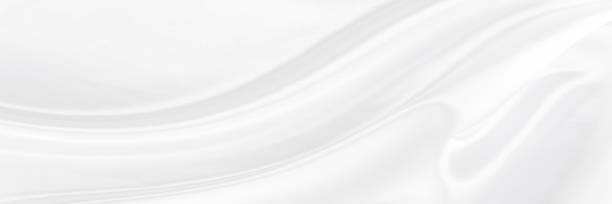 istock White gray satin texture that is white silver fabric silk panoramic background with beautiful soft blur pattern natural. 1317303150