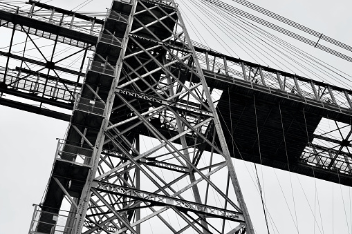 Brooklyn Bridge over East river. Detail of the end abutment. New York, USA